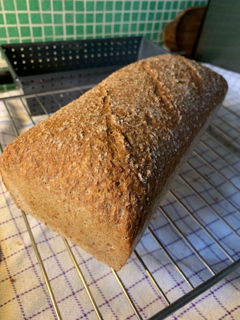100% wholemeal wheat. Long, cold ferment. The dough was hard to work with, to say the very least. The crust thin and quite crunchy. The crumb dense enough for a sandwich bread. And the flavor quite deep and pleasing.